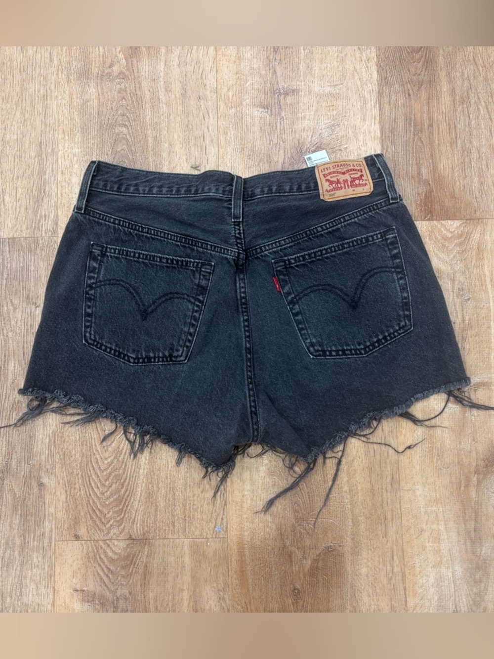 Levi's Washed Black Frayed High-Rise Denim Cutoff Shorts